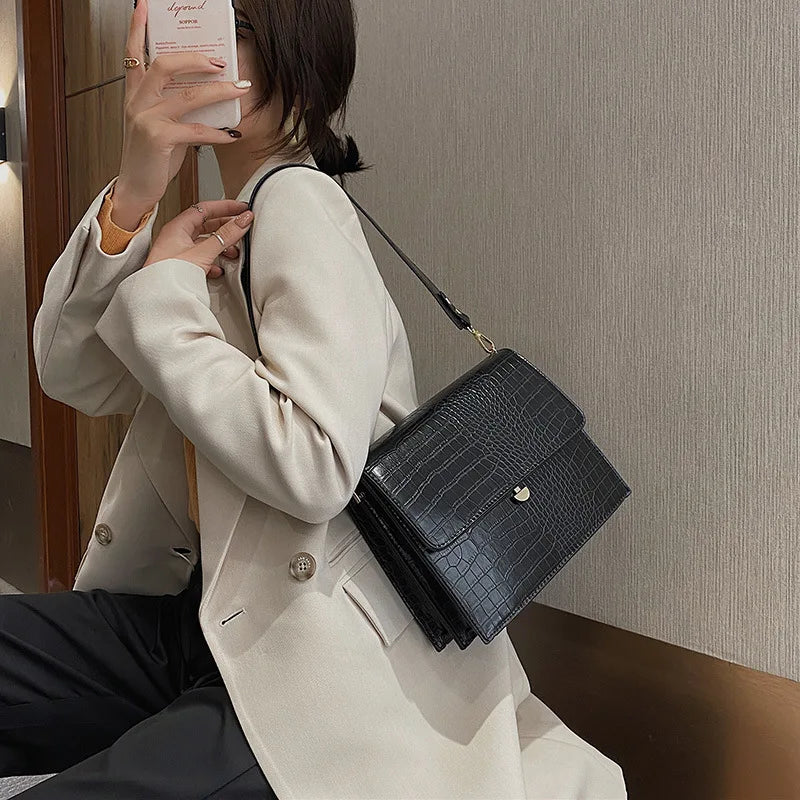 Mini black crossbody bag for work