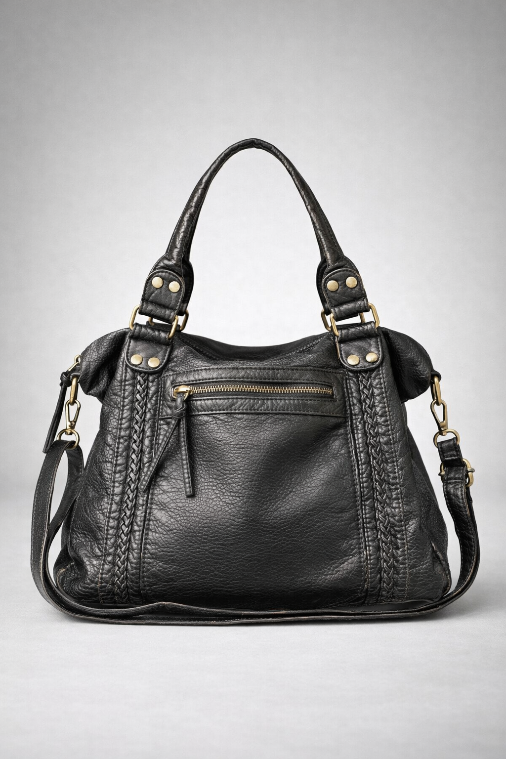 black handbag for school with an exterior zipper pocket