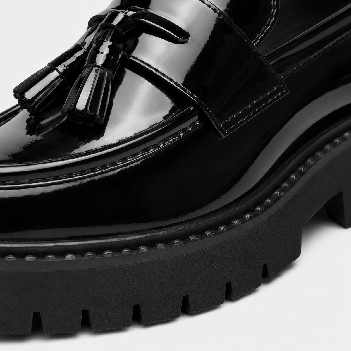 Men's Black and White Leather Tassel Loafers